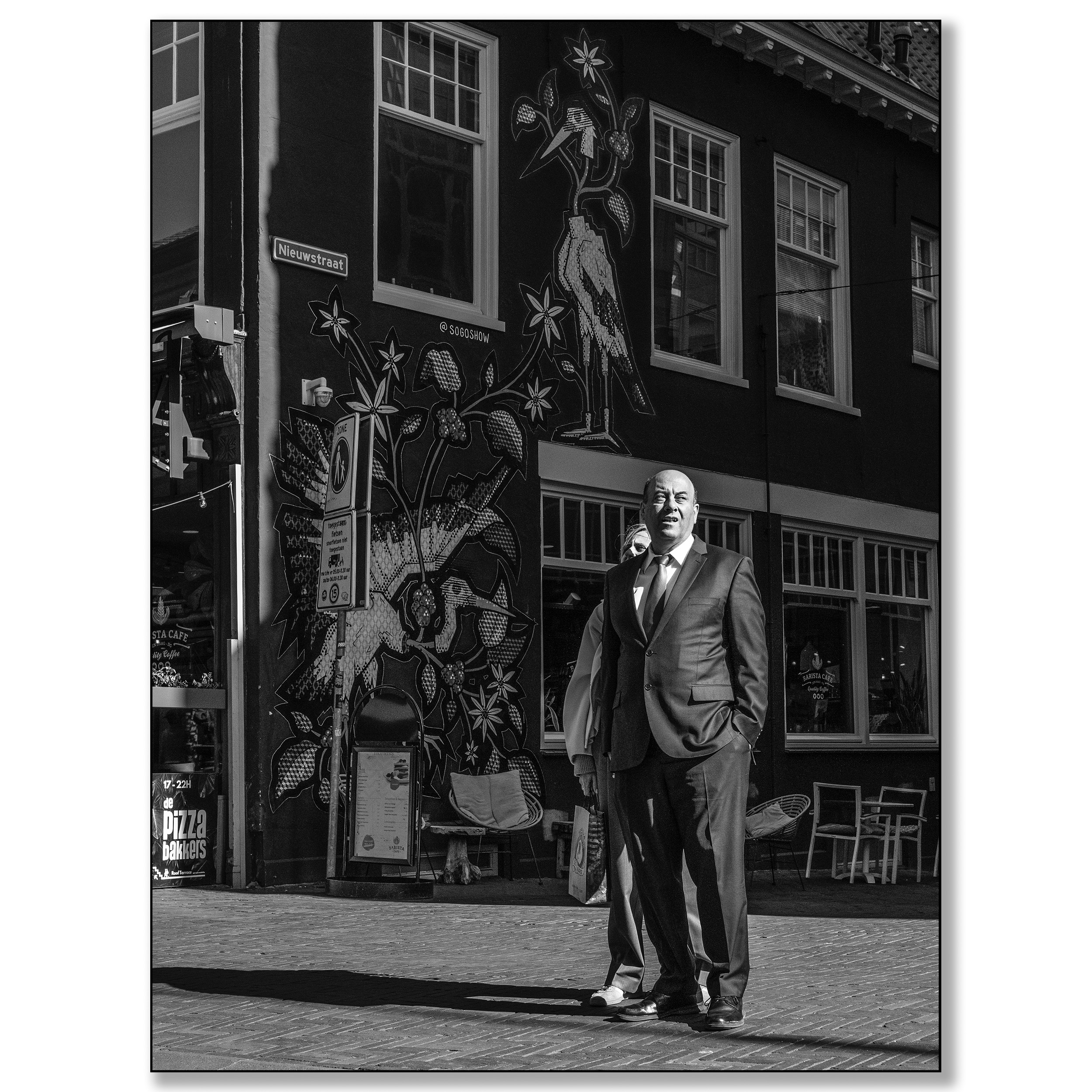 Man in pak, Nieuwstraat Den Haag