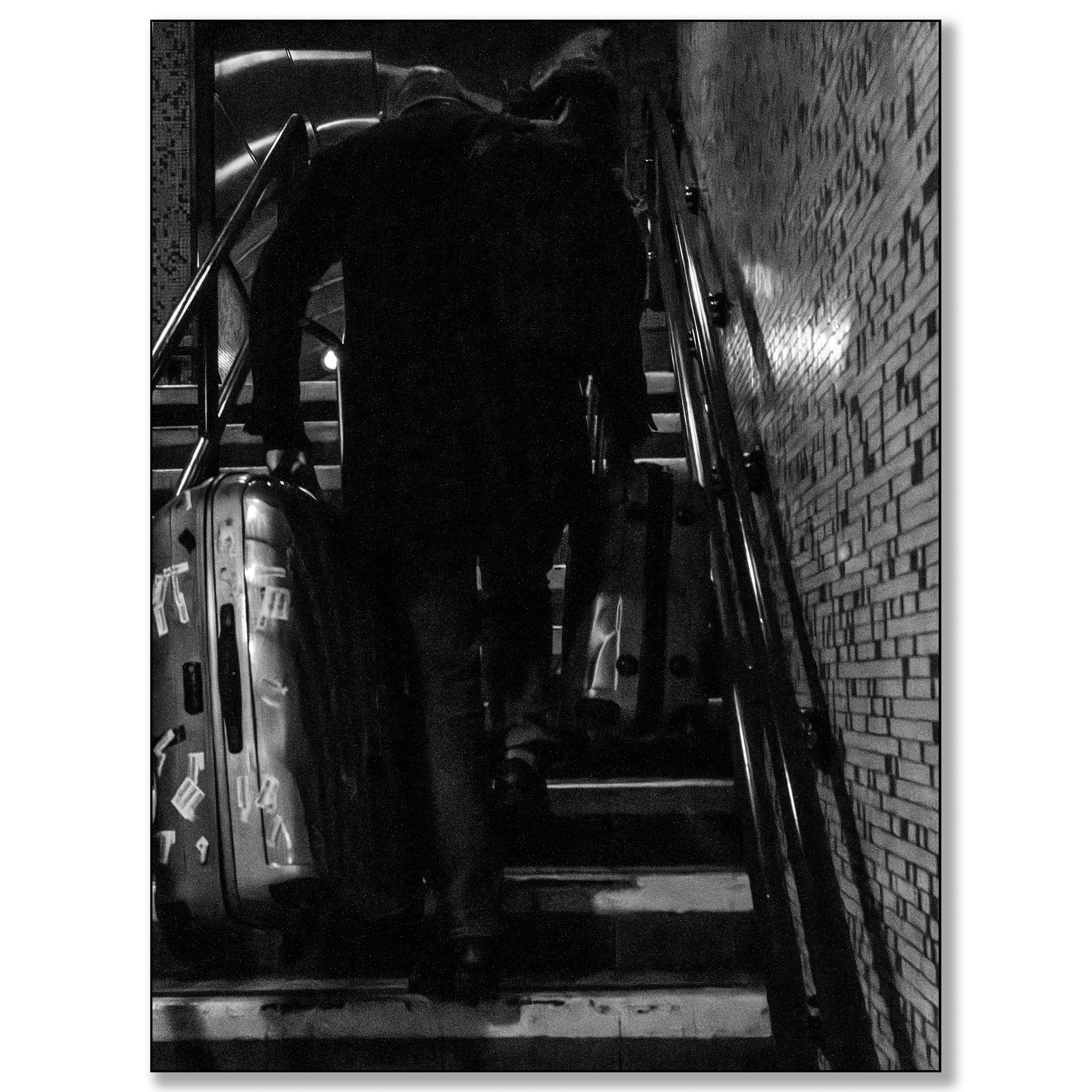 London Underground, man carrying suitcases