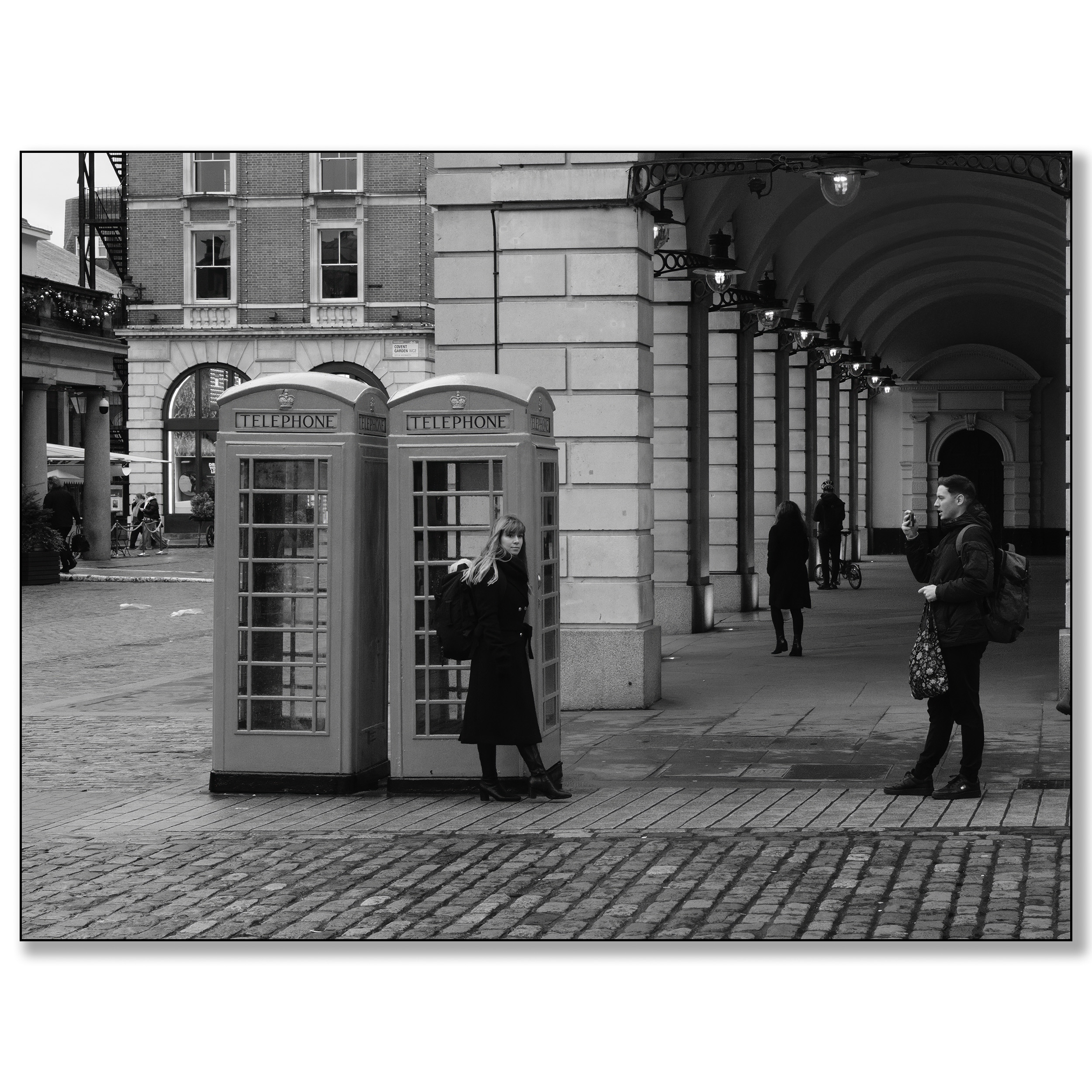 London Covent Garden, Old phone box couple taking picture
