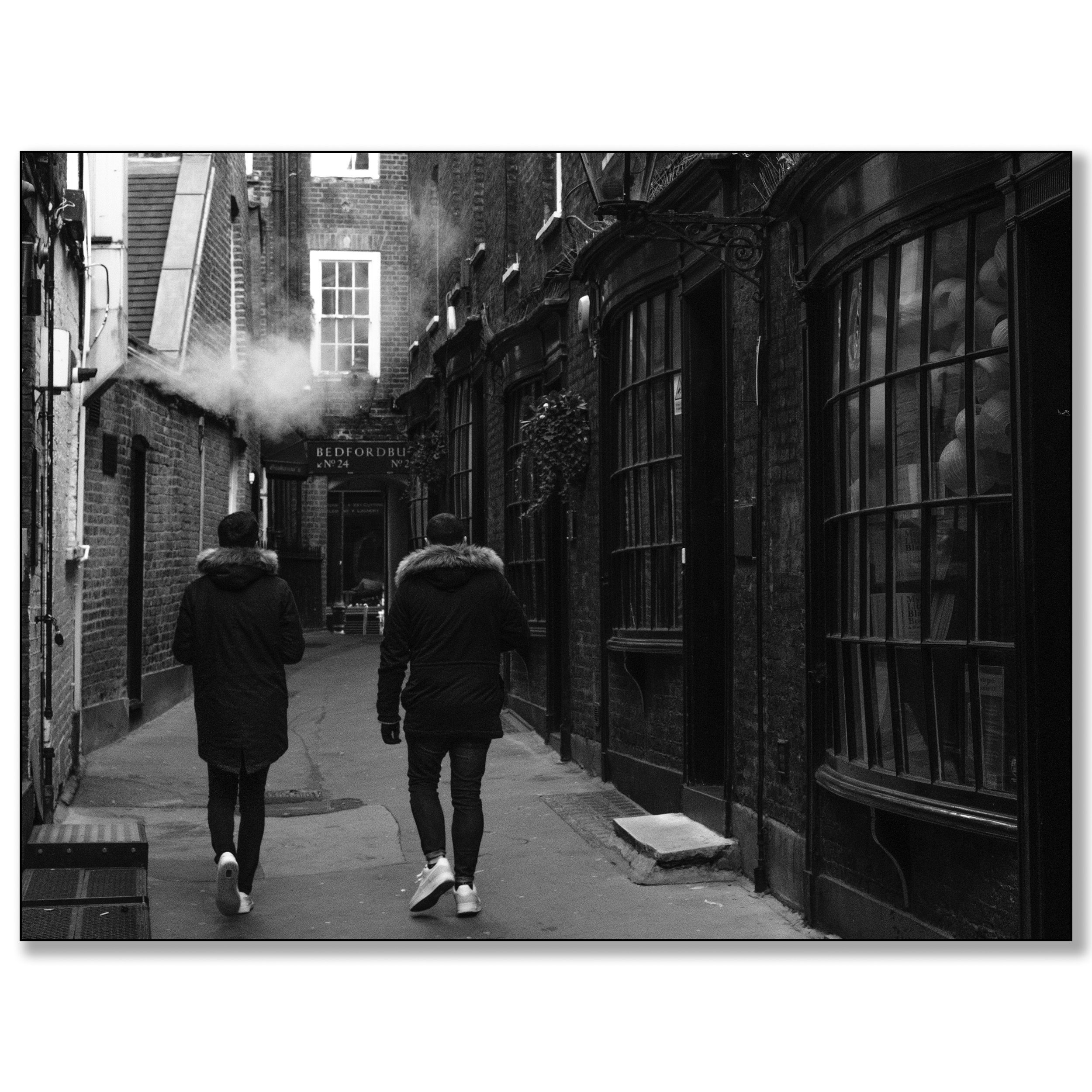 London Goodwin's Court, two men walking